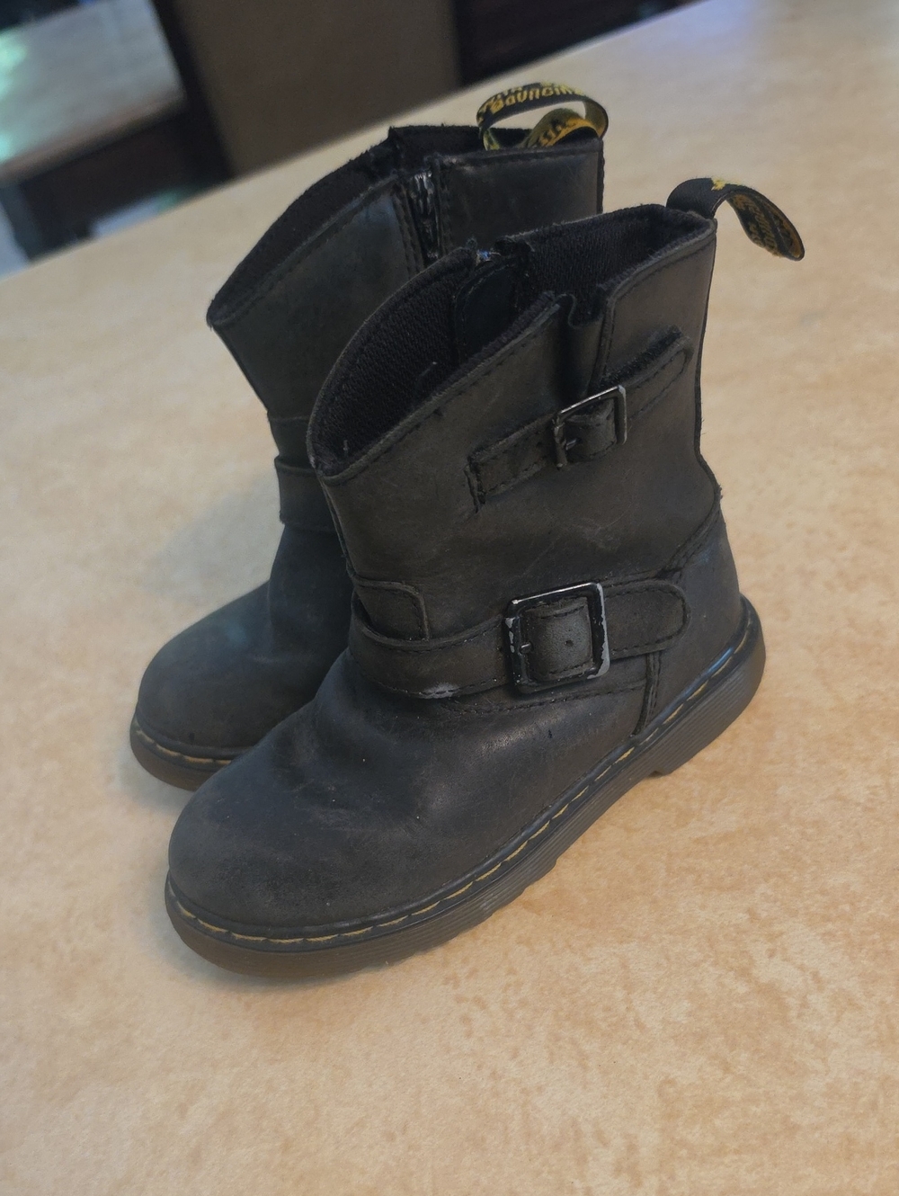 Dr. Martens Kids Black Leather Buckle Boots with Yellow Stitching